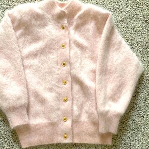 Women’s pale pink angora lined sweater